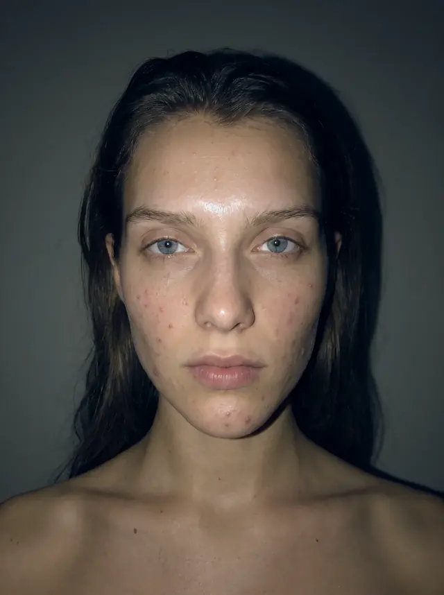 AI-generated illustration: the same face photographed under phone flash light. Not a real person.